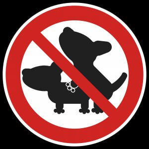 Placa indicando que é proibido cães cruzando
